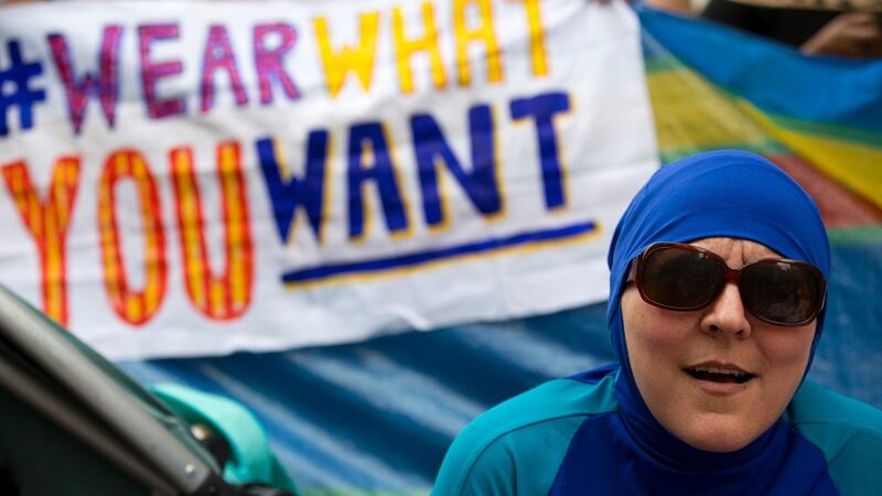 A woman in  a burkini joins a protest outside the French embassy in London on August 25th, 2016, during a Wear What You Want Beach Party to demonstrate against a ban on burkinis on some French beaches and to show solidarity with Muslim women. Photograph: Justin Tallis/AFP/Getty Images
