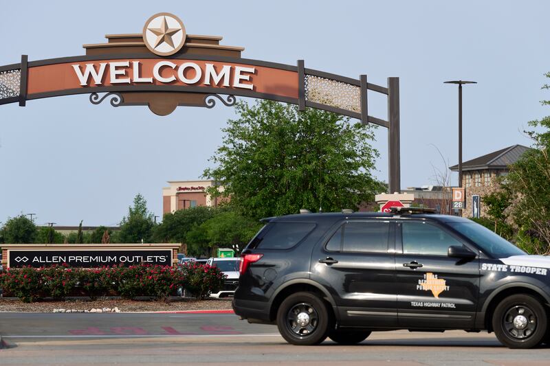 Authorities block the entrance to the Allen Premium Outlets in Allen, Texas, where a shooting left nine people dead, including the suspect on Saturday. Photograph: Cooper Neill/The New York Times