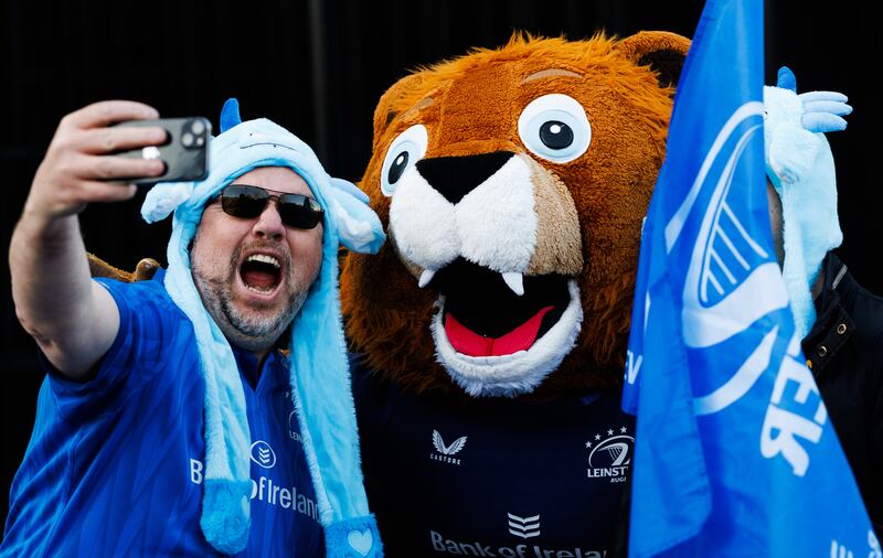 Leinster fans with Leo the Lion. Photograph: James Crombie/Inpho