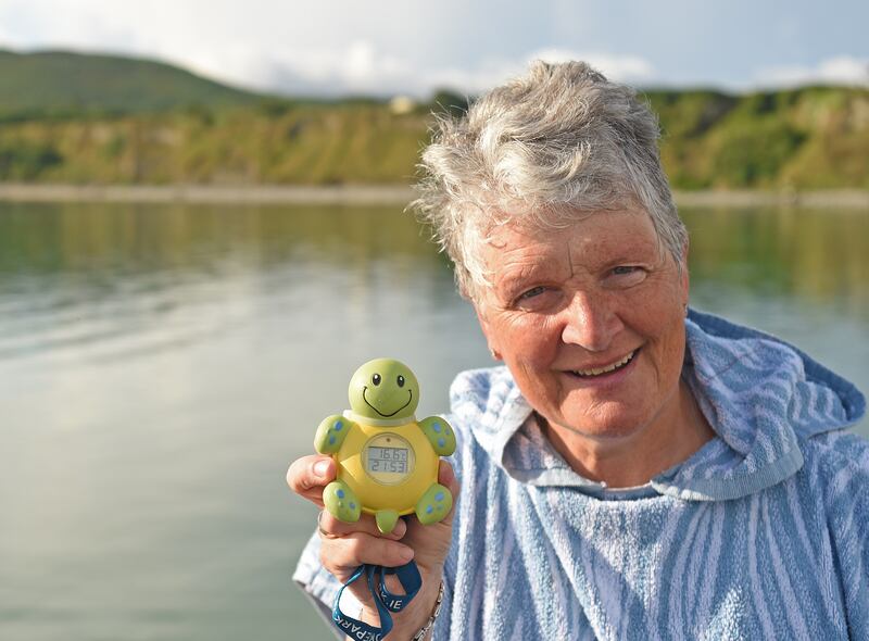 Mairead Staunton with the temperature recorded at Old Head Beach, Louisburgh in Co Mayo. Photograph: Conor McKeown