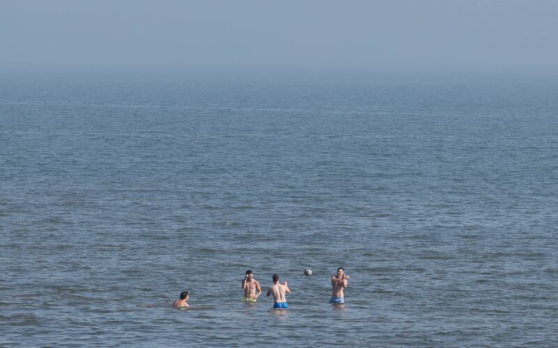 Bathers in the water at Dollymount Beach. Photograph: Alan Betson/The Irish Times

