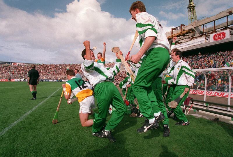 The Offaly bench celebrate at the final whistle of the 1994 final. Photograph: Billy Stickland/Inpho