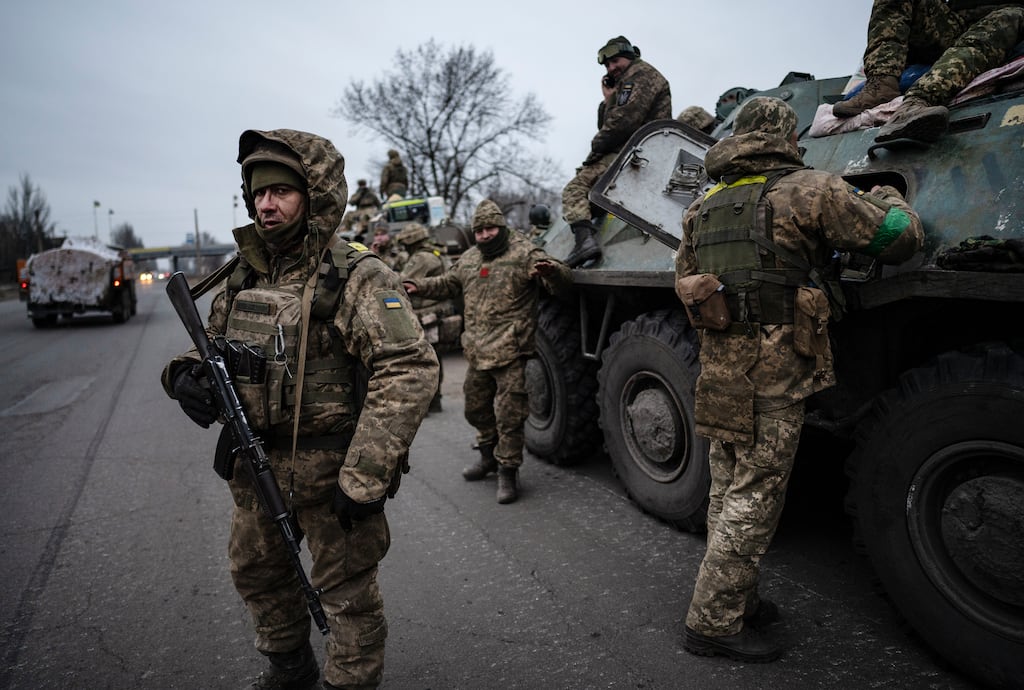 Ukraine soldiers prepare to travel to the front line in the east of the country. Photograph: Lynsey Addario/New York Times