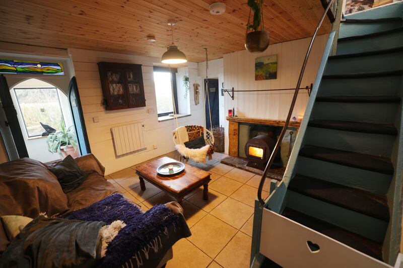 The house layout gave Dillon three rooms downstairs and two rooms upstairs, with the porch opening directly into the livingroom.