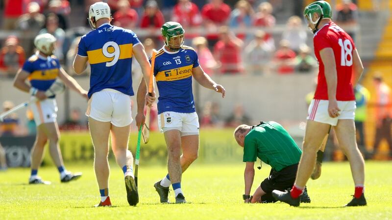 Referee Seán Cleere injured after being hit. Photograph: James Crombie/Inpho