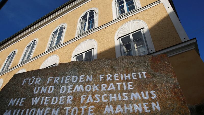 A stone outside the house in which Adolf Hitler was born: It states 'For peace, freedom and democracy. Never again fascism. The millions of dead warn us.' Photograph: Dominic Ebenbichler/Reuters