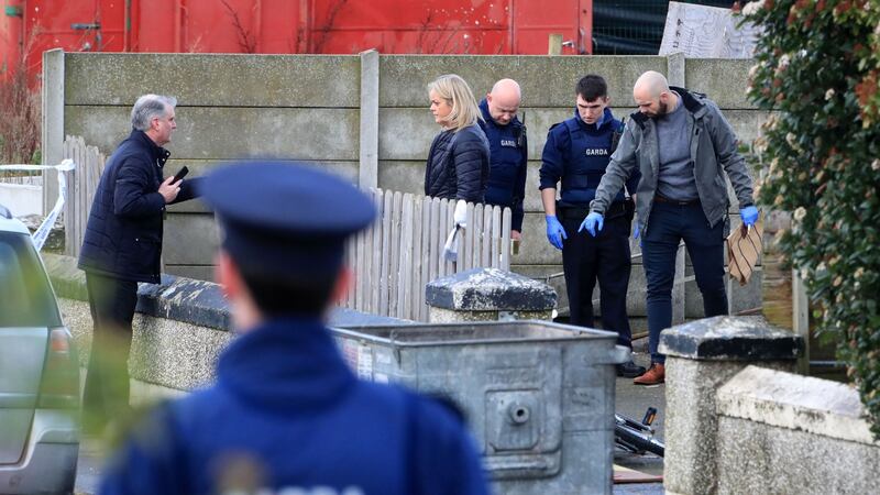 Gardaí at the scene of a shooting in Parlickstown Gardens in west Dublin this afternoon. Photograph: Collins