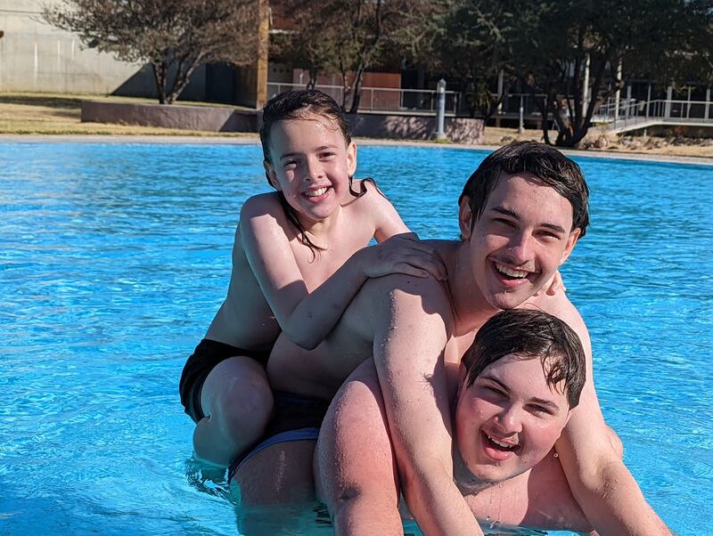 Corban Bruwer (right) with his brothers, Conlan and Callan, two months before being diagnosed