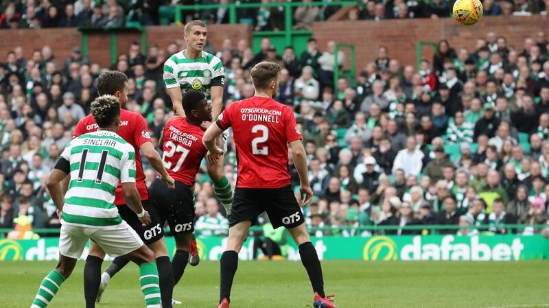 Jozo Simunovic  heads home for Celtic in the Scottish Premiership game against  at Celtic Park. Photograph:  Ian MacNicol/Getty Images