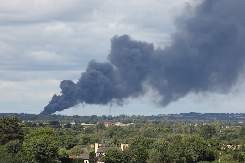 The smoke could be seen from a far distance away from the site of the incident. Photograph: Garrett White/Collins
