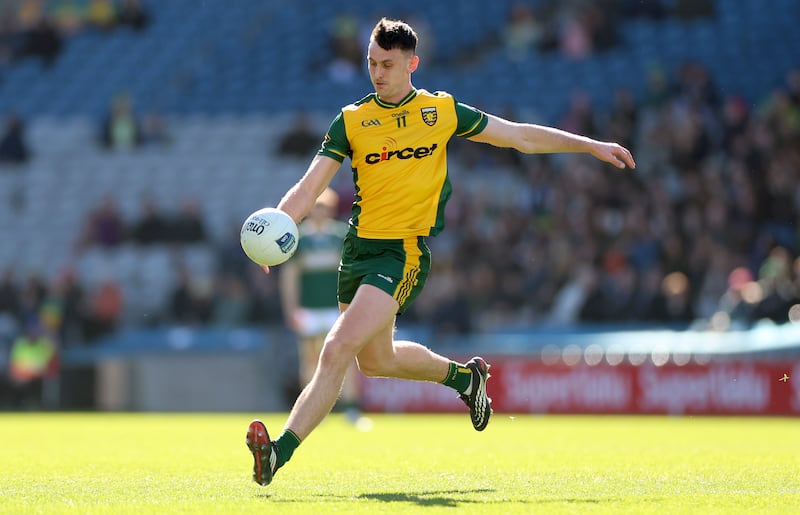 Donegal's Michael Langan kicks during the Division One final against Kerry. Photograph: INPHO/James Crombie