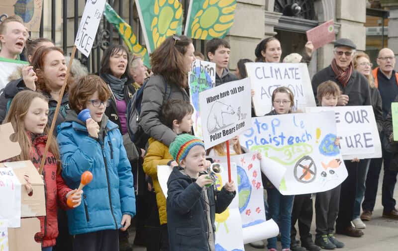 Jacob Kerr (4), from the Navan Road in Dublin, sounds his horn to protest along with other members of Climate Strike Fridays for Future, protesting over climate change outside the Dail last week. Photograph: Alan Betson/The Irish Times
