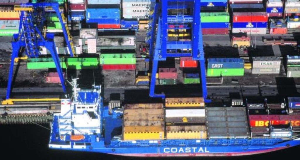 Goods out: a container ship loading in Dublin Port. Photograph: Jason Hawkes/Stone/Getty