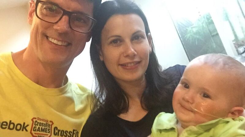 Stephen and Brigetta Lannen with their daughter Nellie Lannen, who has a rare genetic condition, spinal muscular atrophy type one (SMA1).