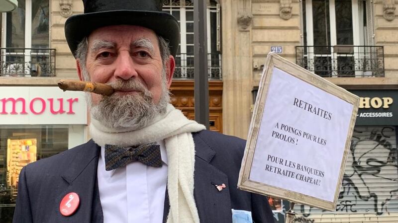Hubert Labrousse, a protester with Attac, is disguised as a caricature rich man at a protest  in Paris on Thursday. Photograph: Lara Marlowe