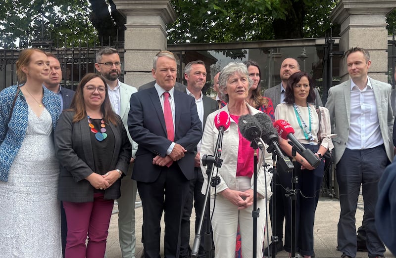 Independent TD Catherine Connolly spoke to the media at Leinster House, Dublin, where she was surrounded by TDs and senators, as she formally launched her bid to become Ireland's next President. Photograph: Cate McCurry/PA Wire