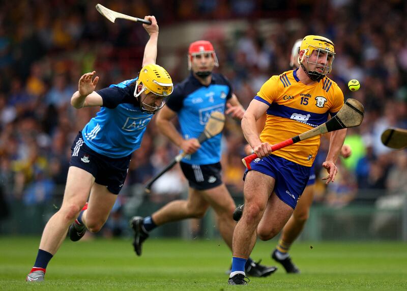 Clare’s Mark Rodgers and Daire Gray of Dublin in action at the Gaelic Grounds. Photograph: Ryan Byrne/Inpho