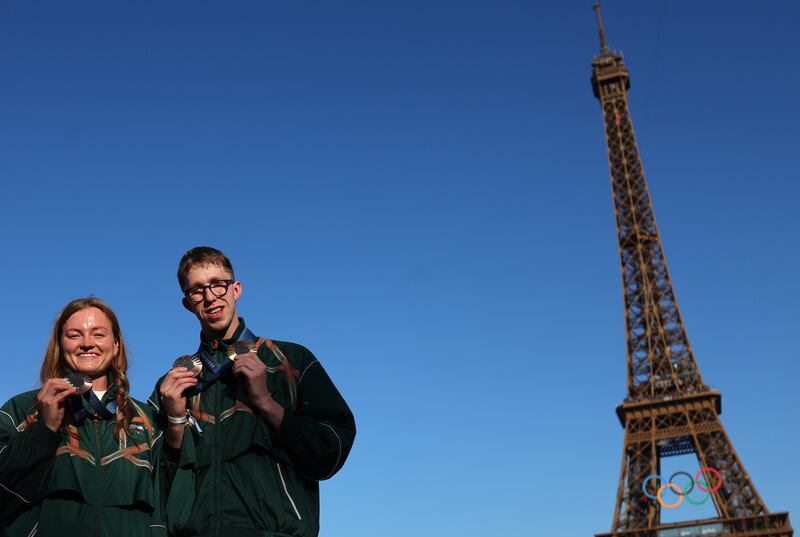 Team Ireland swimmer Mona McSharry with her bronze and Daniel Wiffen with his gold and bronze medals. Photograph: Photograph: James Crombie/Inpho
