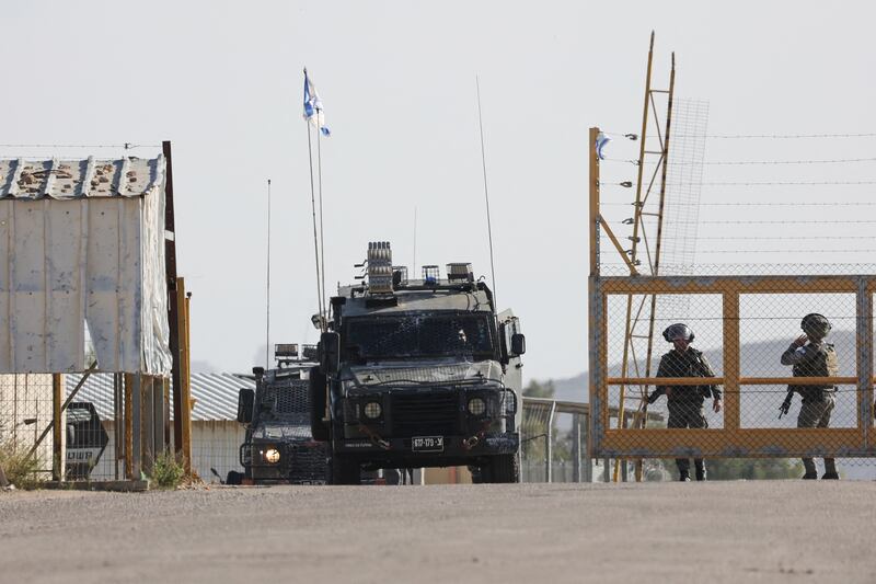 Israeli border guards take position outside the Ofer military camp between Ramallah and Baytunia in the occupied West Bank city amid preparations for the release of Palestinian prisoners in exchange for Israeli hostages held by Hamas in Gaza. Photograph: JAAFAR ASHTIYEH/AFP via Getty Images