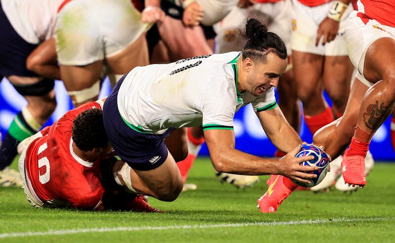 Ireland's James Lowe scores one of Ireland's eight tries against Tonga. Photograph: Dan Sheridan/Inpho