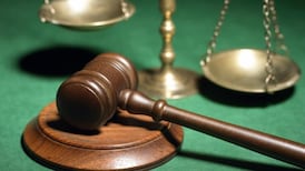 Woman slips on Trim hotel floor and sues