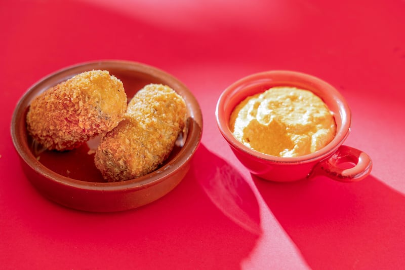 Black pudding croquettes with roasted aioli. Photograph: Harry Weir