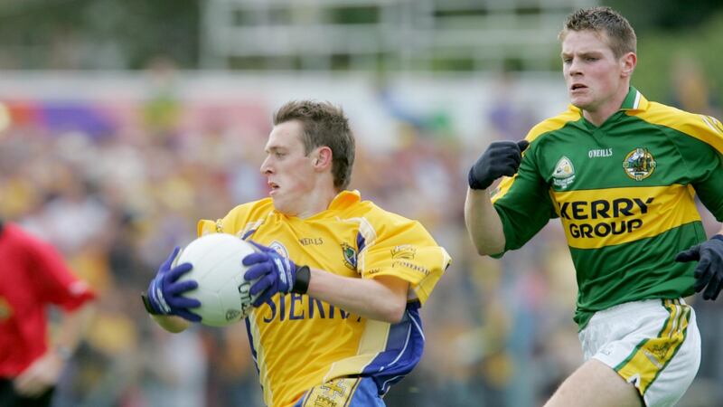 Kerry’s Adrian Geaney tries to catch Roscommon’s Conor Devaney in Ennis. Photograph: Lorraine O’Sullivan/Inpho