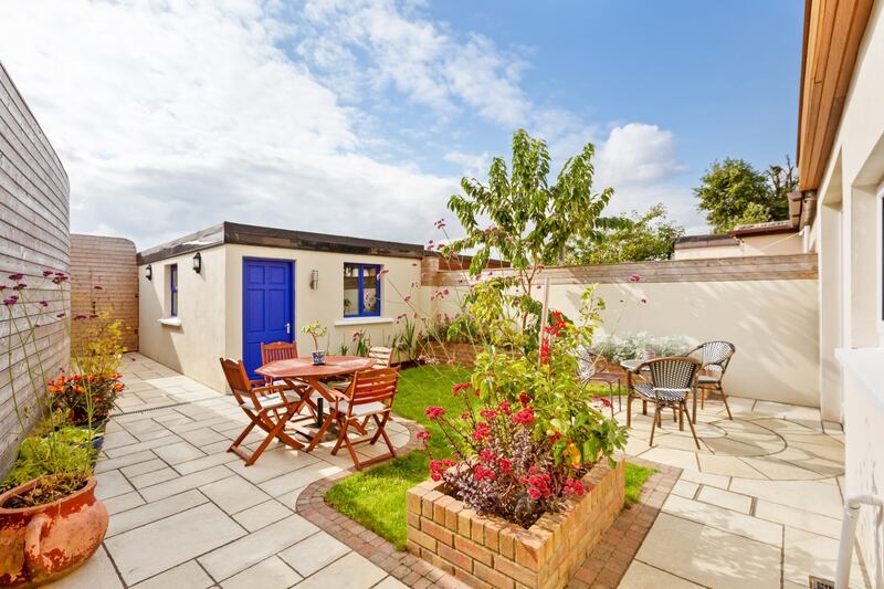 Back garden with storage shed