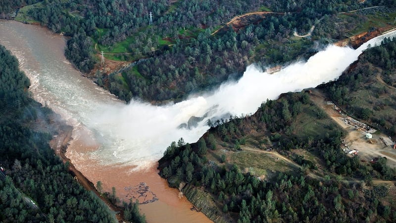 Water continues to run down the main spillway at Lake Oroville on Monday. Photograph: Randy Pench/AP