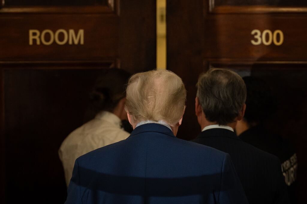 Former US president Donald Trump arrives for his civil fraud trial at New York state supreme court on Monday. Photograph: Adam Gray/Getty Images