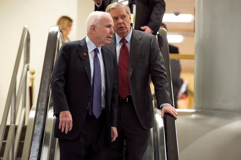 Senators Lindsey Graham and John McCain departing the Capitol in Washington after a vote on February 15th, 2017. Photograph: Al Drago/The New York Times
                      