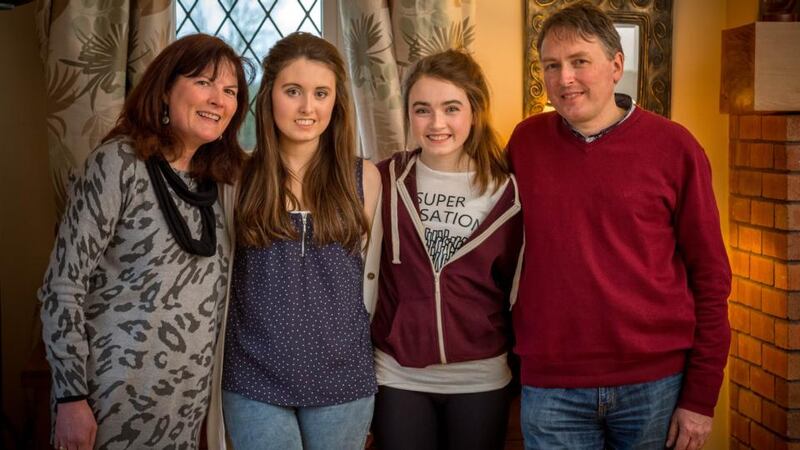 Emily Felix (second from left) at home in Gowran, Co Kilkenny with her mother, Marie, sister, Anna, and her father, Charles. Photograph: Dylan Vaughan