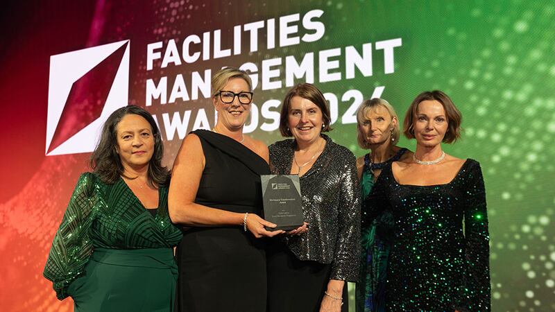 Susan Howard, operations director of healthcare, Bidvest Noonan, presents the workspace transformation award to the Tirlán Hybrid team