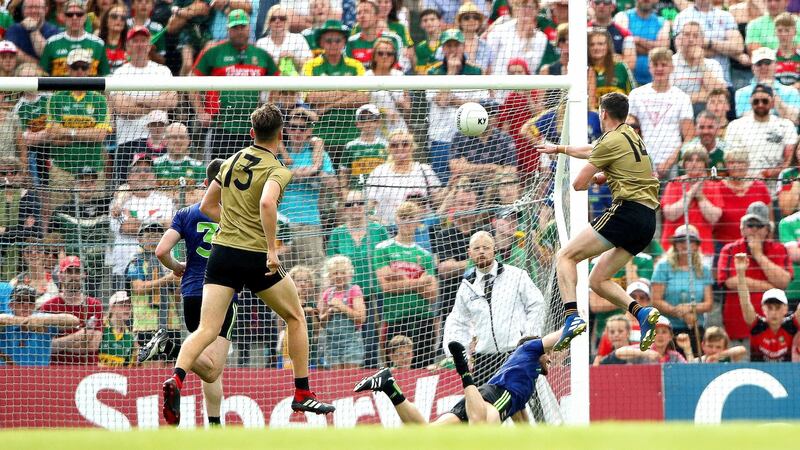 Paul Geaney scores his side’s final goal. Photo: James Crombie/Inpho