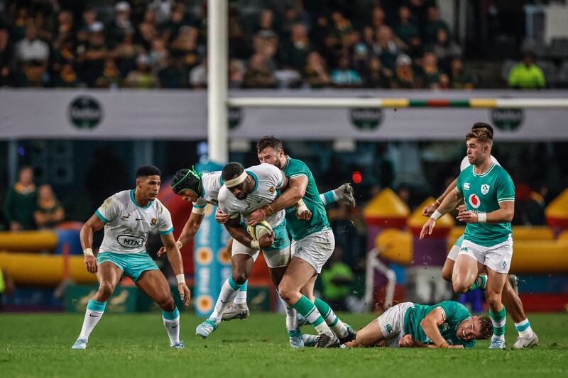 Ireland's Robbie Henshaw makes a tackle. Photograph: Phill Maagakoe/AFP via Getty Images  