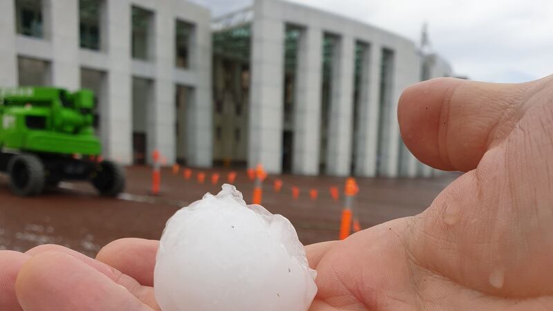 A handout photo  courtesy of Don Arthur shows a hail stone outside the Parliament House in Canberra. Photograph: Getty