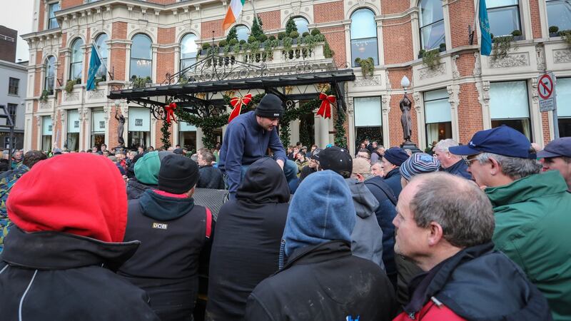 Farmers listen to speeches on St Stephen’s Green during the second day of a protest by farmers. Photograph by Crispin Rodwell/ The Irish Times