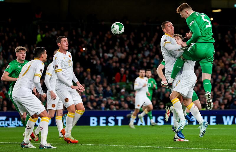 Ireland's Jake O'Brien climbs high to win a header against Bulgaria. Photograph: Ryan Byrne/Inpho