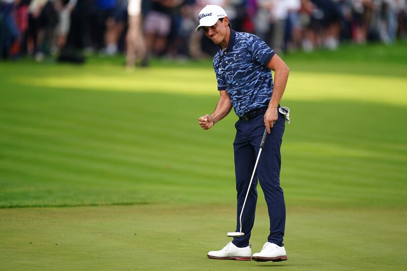 Italy's Matteo Manassero celebrates a birdie on the 18th hole during the third round of the BMW PGA Championship at Wentworth Golf Club. Photograph: Zac Goodwin/PA Wire