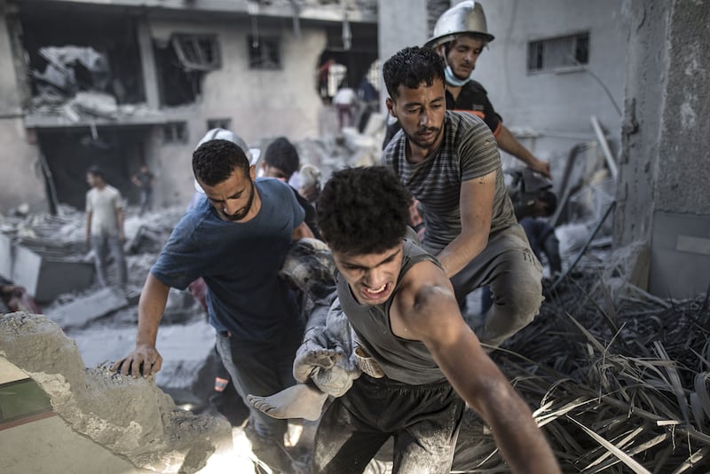 Palestinians carrying a victim of an Israeli strike in Khan Younis, southern Gaza Strip. Photograph: EPA-EFE