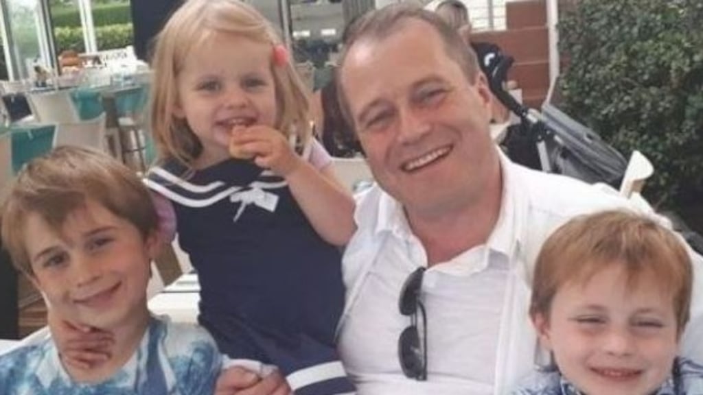 Andrew McGinley with his children Conor (9), Carla (3) and Darragh   (7). Photograph: An Garda Síochána