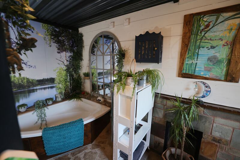 Corner bath in the roomy bathroom. 