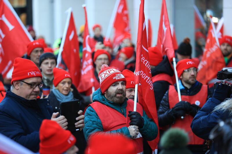 Public sector workers from Northern Ireland Public Service Alliance (NIPSA) on the picket line outside the Northern Ireland Office at Erskine House, Belfast. Photograph: Liam McBurney/PA Wire