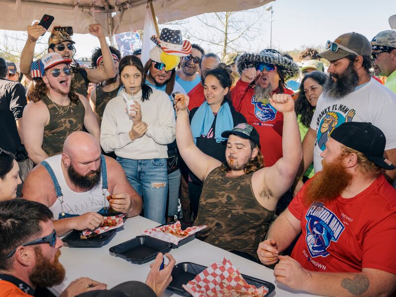 Cameron Cooper celebrates after eating a pile of barbecued pork butt in one of the events at the first-ever Florida Man Games, in St Augustine, Florida last Saturday. Photograph: Jason Andrew/The New York Times
                      