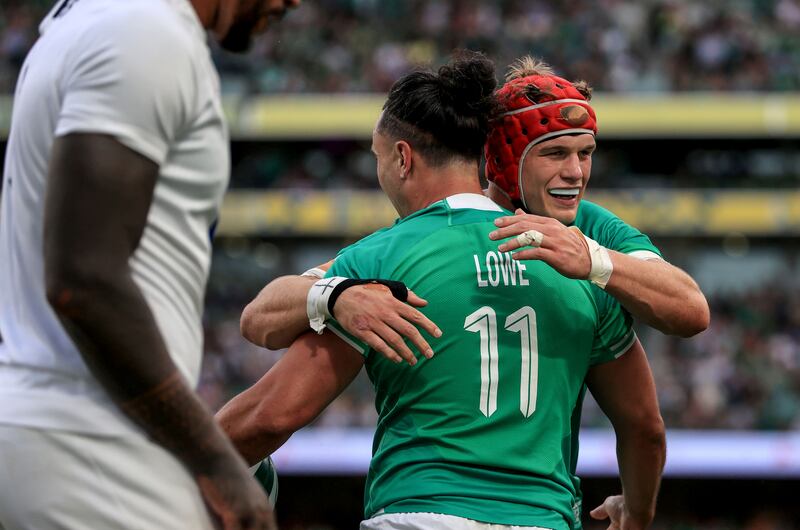 Ireland's James Lowe celebrates scoring a try with Josh Van der Flier. Photograph: Dan Sheridan/Inpho