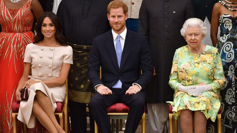 Meghan, Prince Harry and Queen Elizabeth in June 2018. Photograph: John Stillwell/AFP via Getty Images