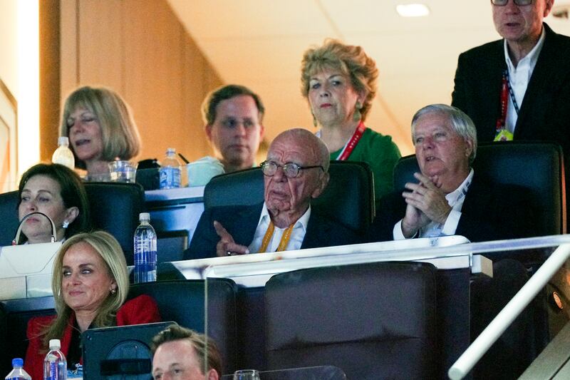 Ireland's Ambassador to the United States Geraldine Byrne Nason behind businessman Rupert Murdoch at the Republican National Convention earlier this month in Milwaukee. Photo: Jamie Kelter Davis/The New York Times