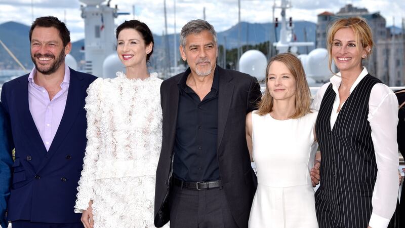Money Monster: Caitriona Balfe with Dominic West, George Clooney, director Jodie Foster and Julia Roberts in Cannes. Photograph: Clemens Bilan/Getty