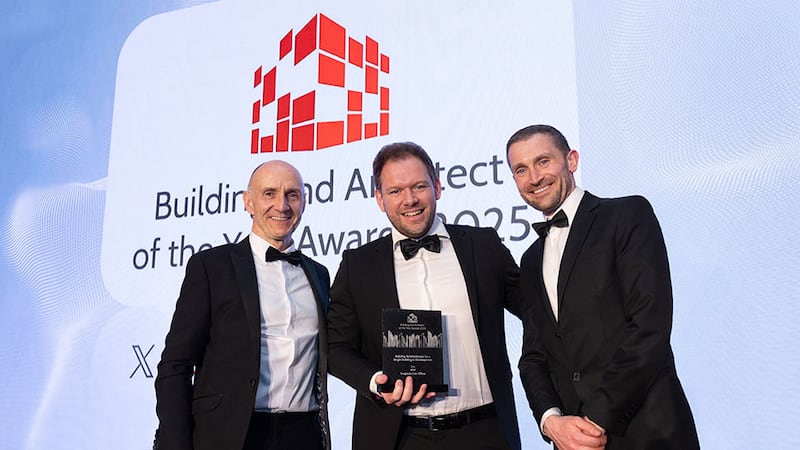 David Dowling, commercial director, presents the building refurbishment for a single building or development award to Elliott Ballam, BDP and Glen Morgan, Louth County Council