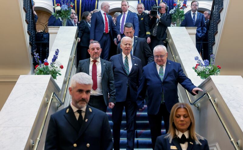 Senator Jerry Buttimer, US president Joe Biden and Ceann Comhairle Seán Ó Fearghaíl negotiate the staircase in Leinster House on Thursday. Photograph: Tony Maxwell/PA